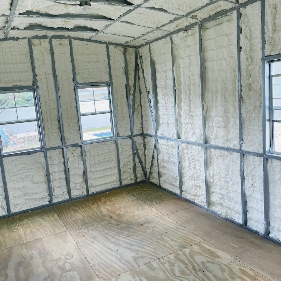 Closed-cell spray foam insulation applied to wall cavities in a residential project in Little Elm